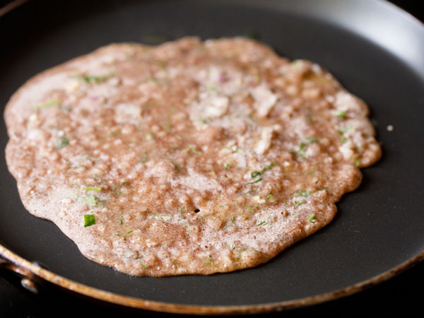 cook ragi dosa on tawa