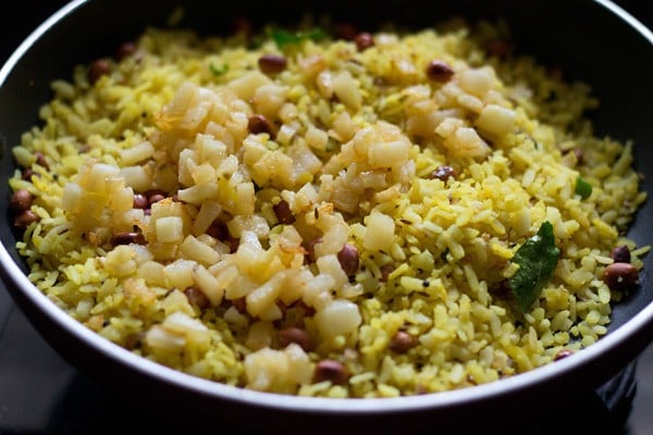 sautéed potatoes added to the poha. 