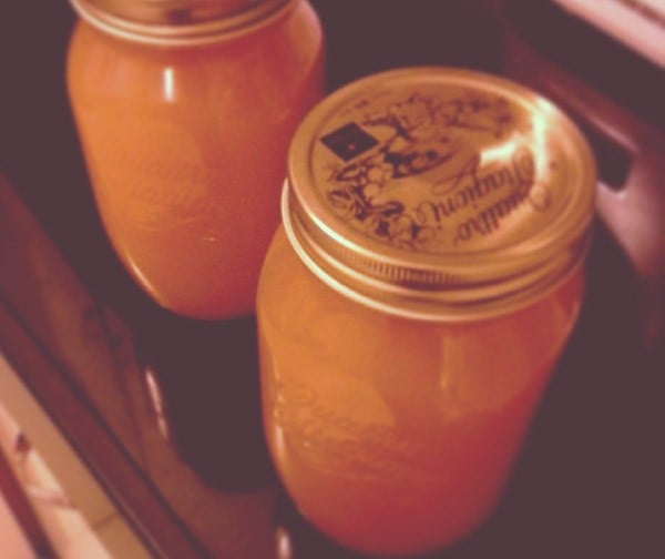 orange squash jars kept in refrigerator. 