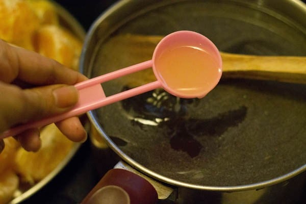 sugar dissolved in water and adding lemon juice to the solution. 