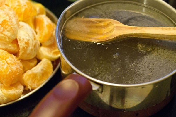 sugar solution in the pan kept on heat. 