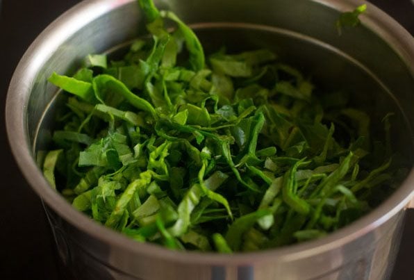 chopped spinach leaves in a blender