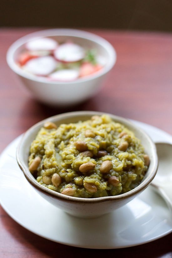 palak khichdi served in a bowl.