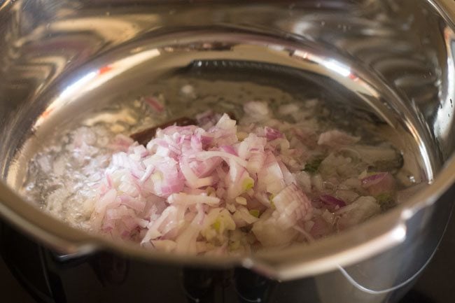 chopped red onion added to the tempering.