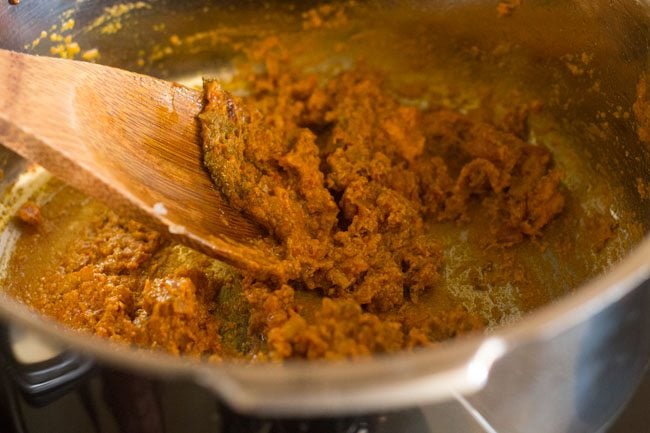 the masala paste looks thick after adding the dried spices.
