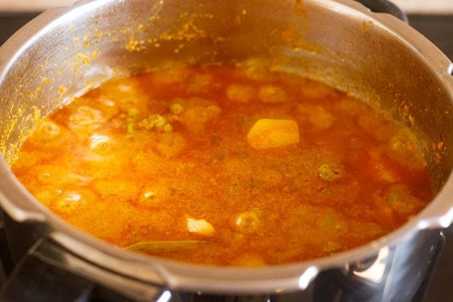 potato peas kurma in the pot after pressure cooking.