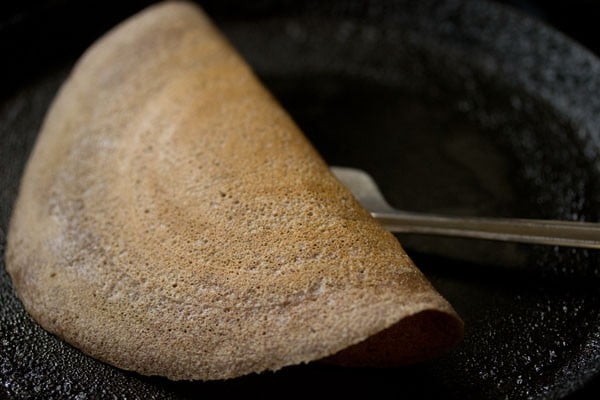 ragi dosa folded and ready to be served