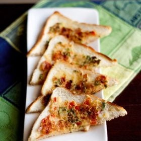 suji toast triangles served on a long white platter.