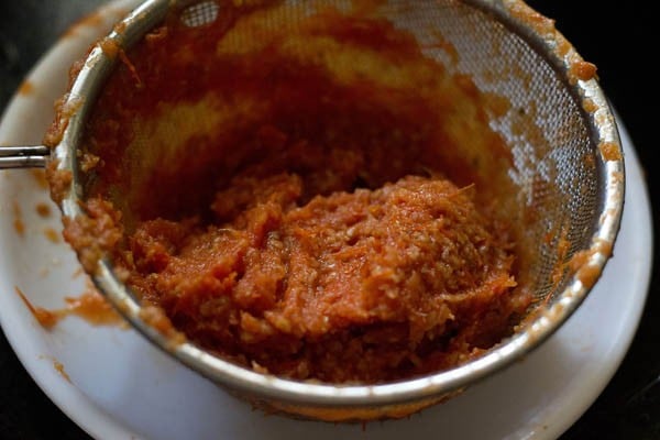 tomato pulp in strainer