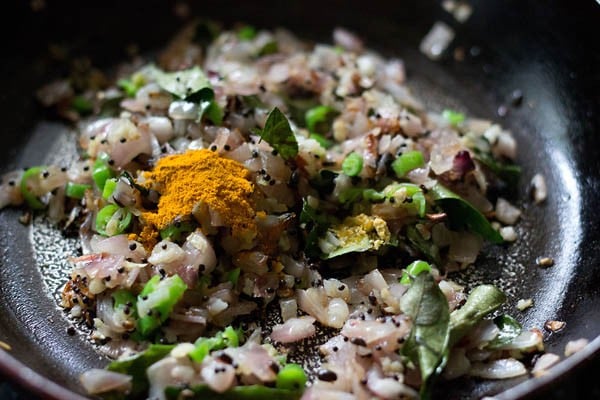 Add turmeric powder and asafoetida to the pot. 