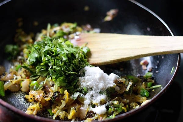 Add chopped coriander leaves and salt to the pan. 