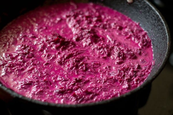 cooking grated beetroot and milk mixture