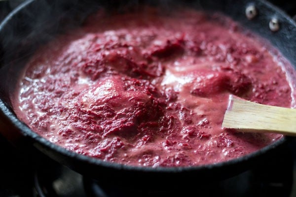 cooking grated beetroot and milk mixture