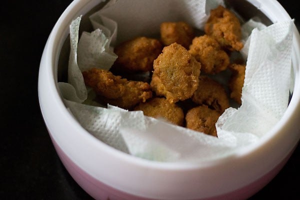 fried chana dal pakora in kitchen paper towels