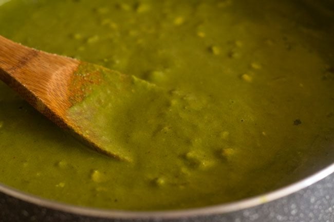 stir and mix palak corn curry