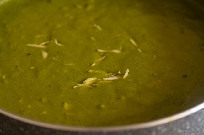 ginger julienne added to palak corn curry