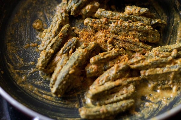 garam masala powder added to cooked besan bhindi. 