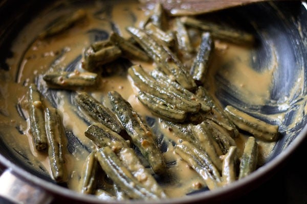 sautéed okra added to roasted gram flour and mixed. 