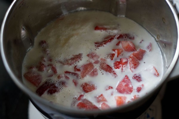 full fat whole milk, cream, sugar and chopped fresh strawberries in a blender jar