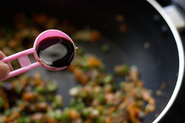 soy sauce being added