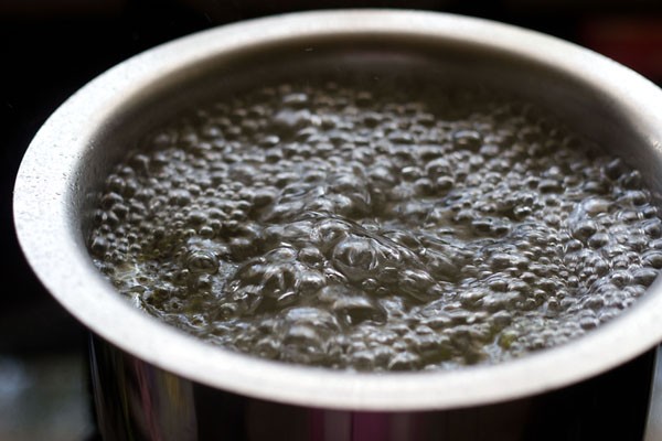 water being boiled in a pot
