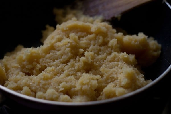cooked moong dal halwa in the non stick pan.