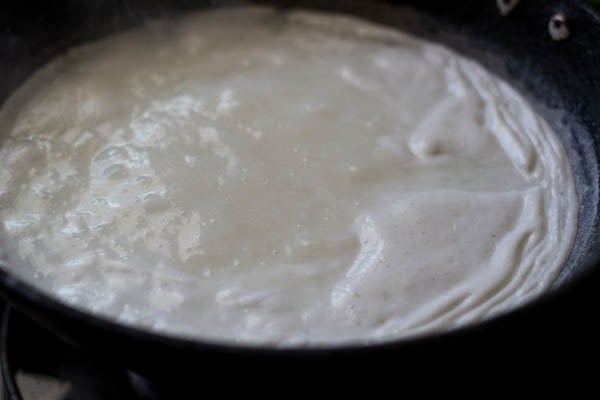 boil milk to make moong dal halwa