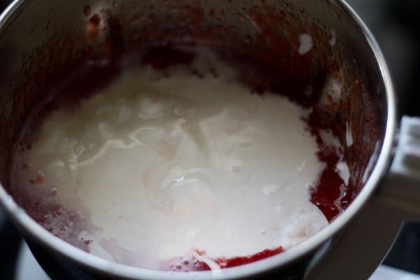 add yogurt cream to strawberry puree