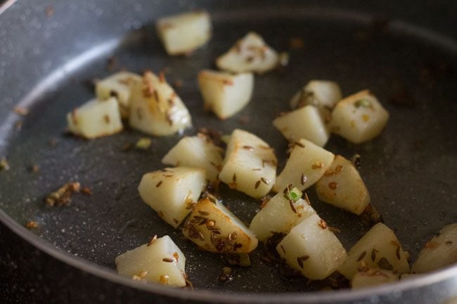 sauteing potatoes till edges become crisp