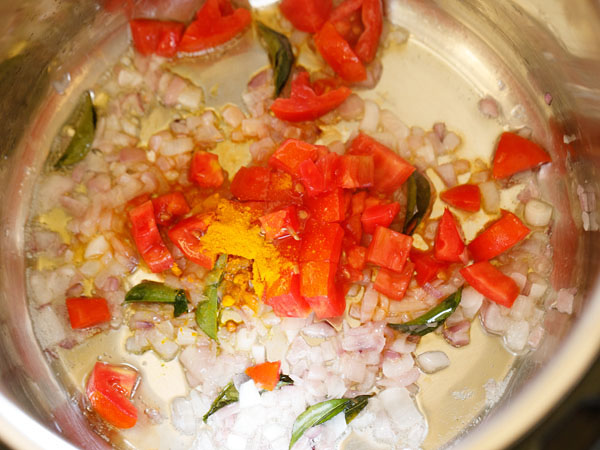 Add chopped tomatoes and turmeric powder