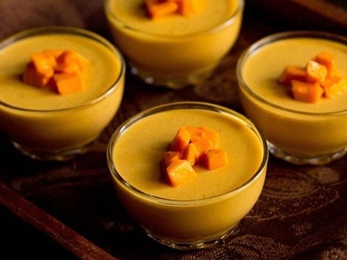 mango panna cotta served in glass bowls