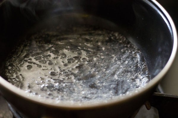 agar agar strands simmering in water.