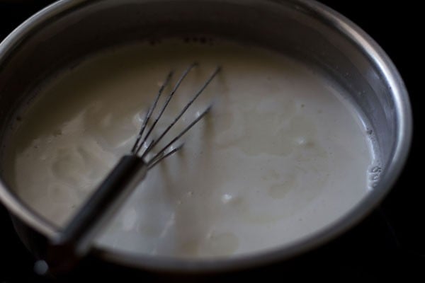 milk mixture is just beginning to bubble and simmer, which means it is time to remove from the heat source.