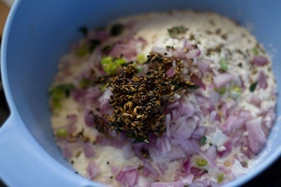 tempering and salt added to bowl. 