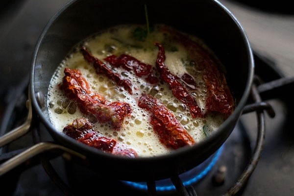 frying ingredients for tempering in hot ghee or oil. 