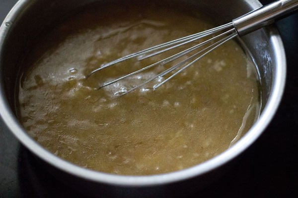 Whisk stirring banana puree in bowl