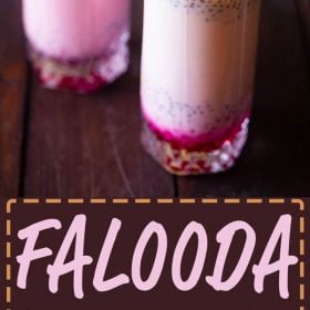 Pink layered falooda drink with chopped nuts on top with a text layover
