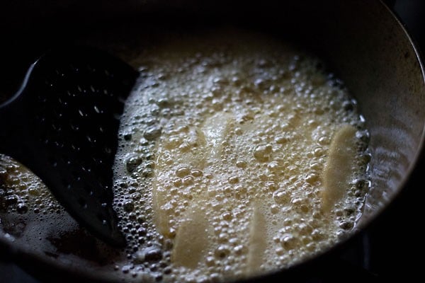 frying idli fingers in hot oil. 