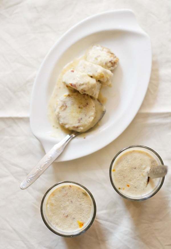 kulfi ice cream with khoya on a white plate and sliced