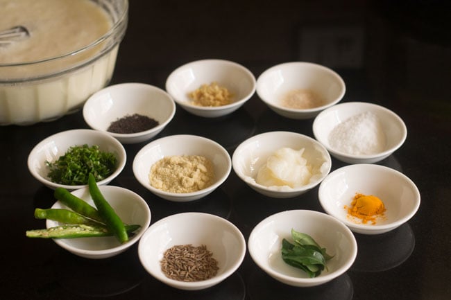 ingredients kept ready for maharashtrian kadhi recipe. 