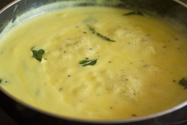 cooking maharashtrian kadhi. 