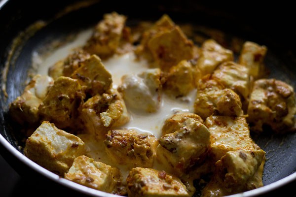 cream and salt added to the paneer cubes. 