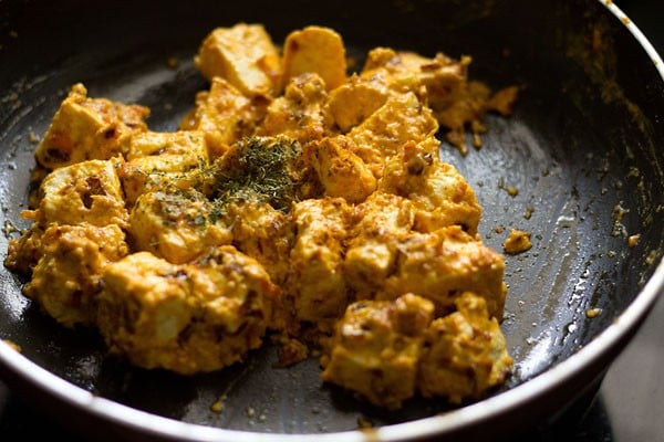 crushed kasuri methi and garam masala powder added to the malai paneer. 