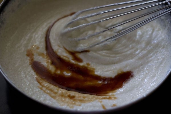 whisking the cream cheese, cream, sugar.