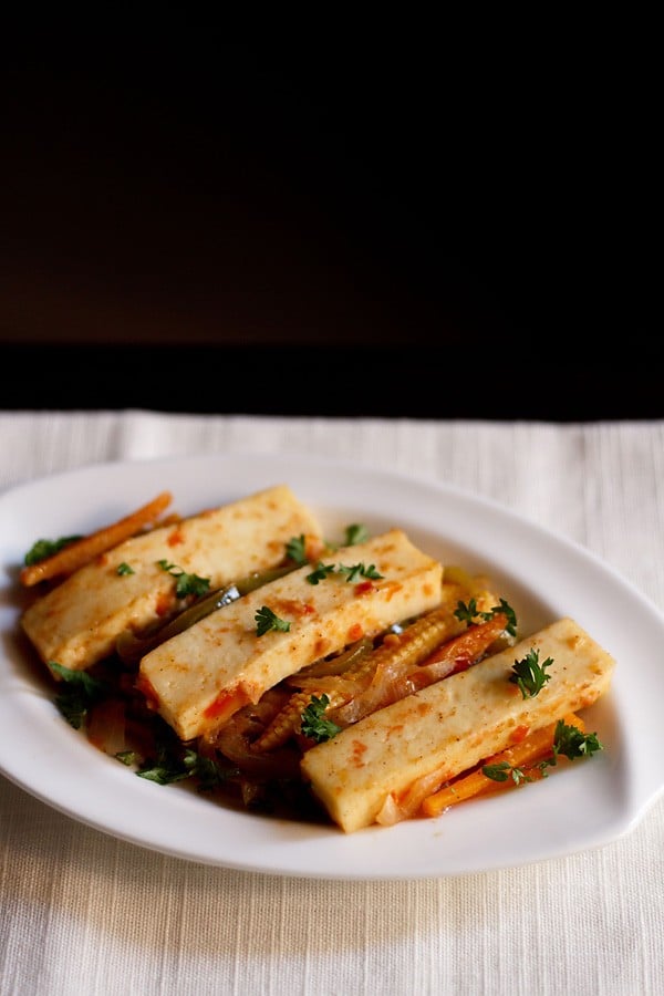 paneer jalfrezi served on a white plate