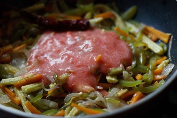 added tomato puree to veggies mixture