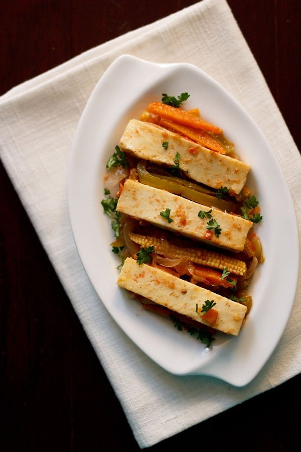 paneer jalfrezi served on a white plate