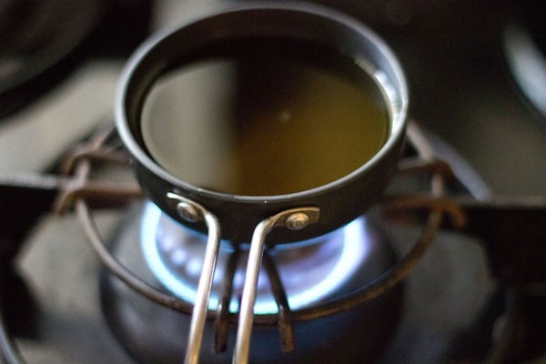 heating sesame oil in a small pan. 