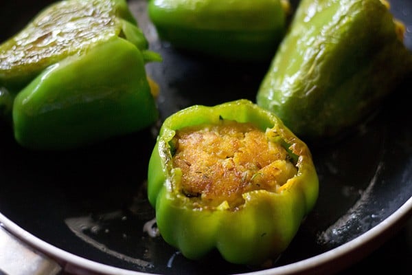 cooked stuffed capsicum in pan