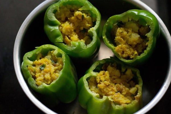 stuff potato mixture in capsicum